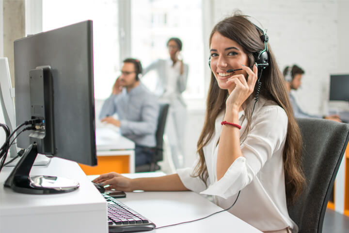 Contact Center Agent smiling 