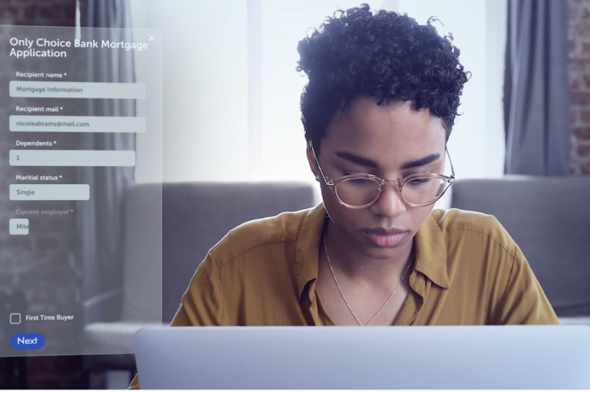 A woman in front of her laptop