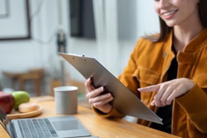 A woman looking at her tablet